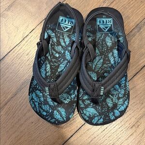 Reef Kids Black and Teal Leaf Flip Flops